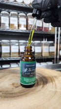 Load image into Gallery viewer, Organic Pain Relief & Sciatica Massage Oil | Nerve & Muscle Pain Relief 2oz | Phoenix Lynn